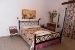 Bedroom of an apartment, Glaronissia Hotel, Pollonia, Milos, Cyclades, Greece