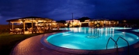 Pool area overview by night, Plaza Beach Hotel, Naxos
