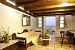 An apartment interior and balcony, Musses Studios & Apartments, Oia, Santorini, Cyclades, Greece