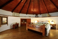 The first floor bedroom of the Aera Milos Windmill, Tripiti, Milos