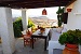 Exterior sitting area and view, Windmill of Anastasia, Milos, Cyclades, Greece