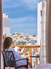 East island City view from the balcony, Aressana SPA Hotel & Suites, Fira, Santorini, Cyclades, Greece