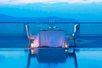 Dining by the pool of Belvedere Suites, Firostefani, Santorini