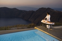 Spa therapy by the pool of Avaton Resort & Spa, Imerovigli, Santorini