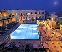 Pool by night at the Rose Bay hotel, Kamari, Santorini