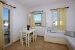 The living room of another apartment , Coralli Apartments, Livadakia, Serifos