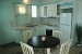 Apartment kitchen and dining table , Kampos Home, Apollonia, Sifnos, Cyclades, Greece