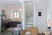 Kitchen and the interior staircase leading to the upper floor, Maisons a la Plage, Faros, Sifnos, Cyclades, Greece