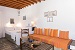 Bella studio bedroom with siiting area, Aris & Maria Houses, Kastro, Sifnos, Cyclades, Greece