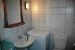 Upper floor apartment’s bathroom with shower and washing machine, Styfilia Apartments, Platys Yialos, Cyclades, Sifnos