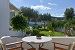 View from a ground floor veranda, Alexandros Hotel garden, Platy Yialos, Sifnos, Cyclades, Greece