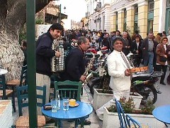 Sunday musicians making the rounds of the cafes always stop at cafe Dioscouri