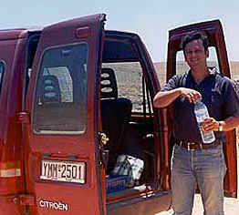 Christos demonstrates some Greek hospitality.