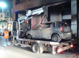 burned car in athens, greece