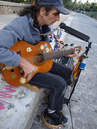 Giorgos Gavalas, bass player, street musician, athens, Greece